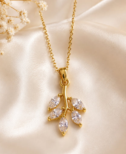 NAXAYA Aurora Leaf Pendant Necklace – Gold-Plated Crystal Elegance