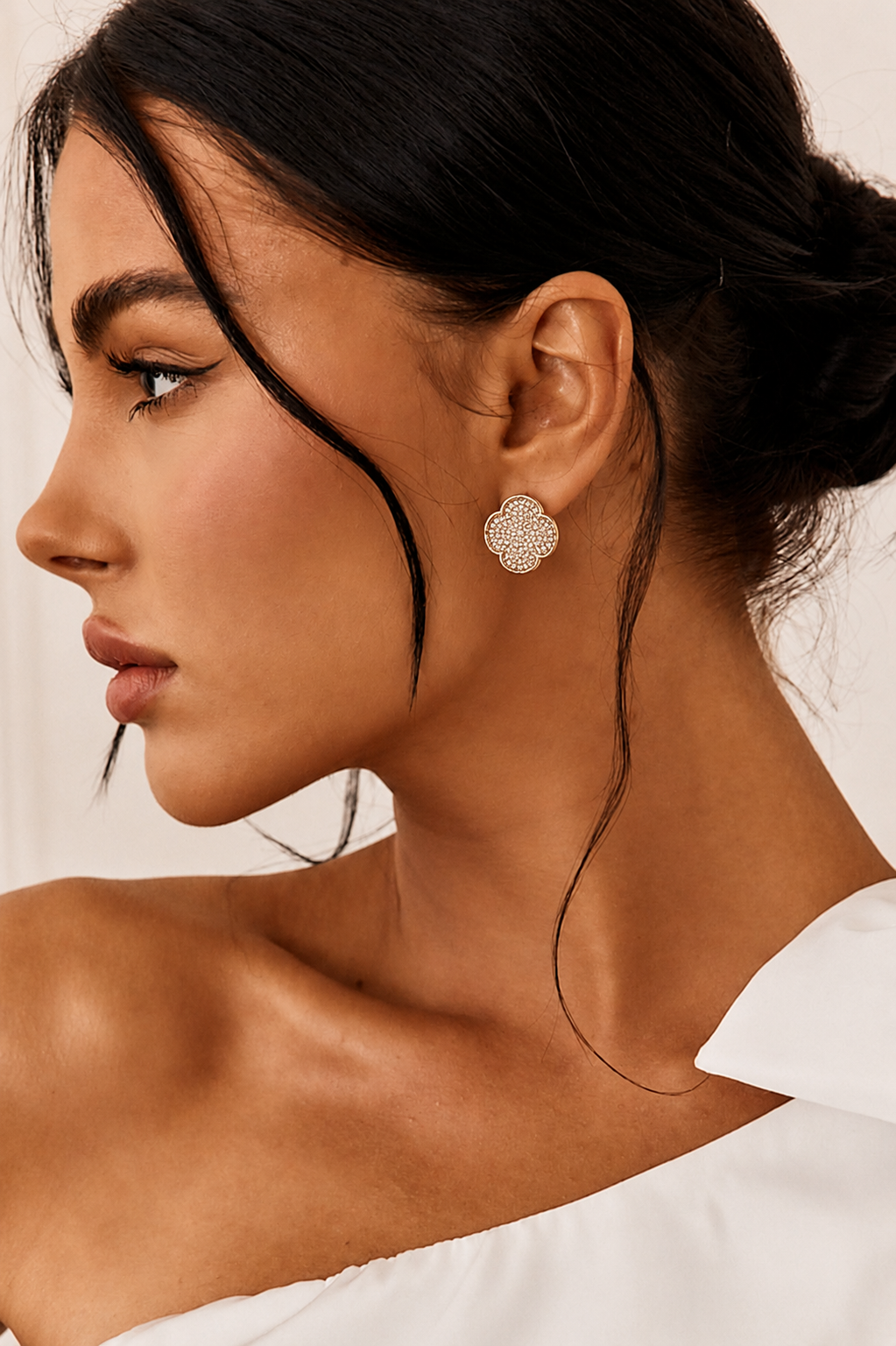 Premium gold plated flower stud earrings by NAXAYA