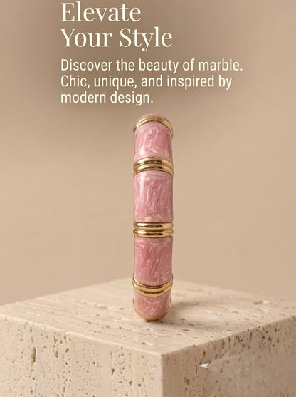 “Elevate Your Style” text: Side view of NAXAYA Aura Pink bangle standing