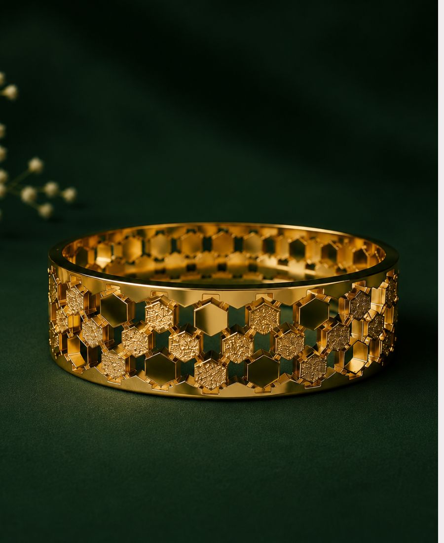 Luxury close-up of NAXAYA Hexovra geometric gold bracelet