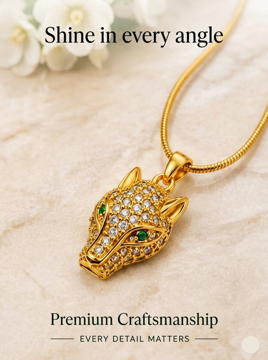 Gold panther head pendant studded with stones, text "Shine in every angle".